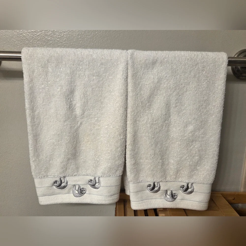 White Hand Towels with Embroidered Sloth Detail
